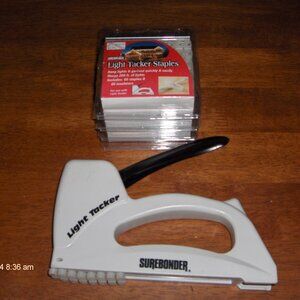 Surebonder Light Tacker and 4 packs (240) of staples and insulators